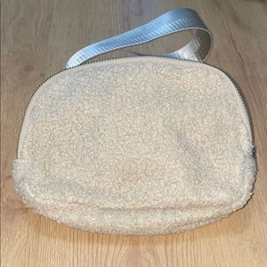 Cream Sherpa adjustable belt bag